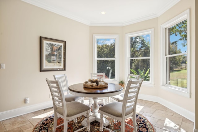 2971 Spanntown Rd, Arrington, TN 37014 - dining space featuring stone tile floors, ornamental molding, baseboards, and recessed lighting