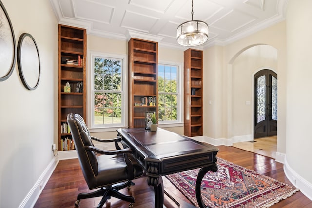 office with ornamental molding, dark wood-type flooring, an inviting chandelier, and french doors