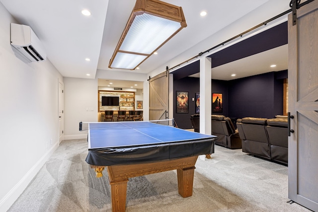 rec room with a barn door, a wall mounted AC, light colored carpet, and pool table