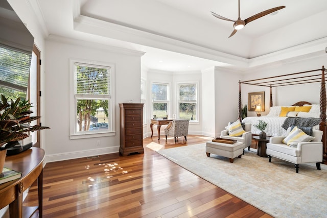 2971 Spanntown Rd, Arrington, TN 37014 - bedroom featuring multiple windows, wood-type flooring, baseboards, a tray ceiling, and ornamental molding