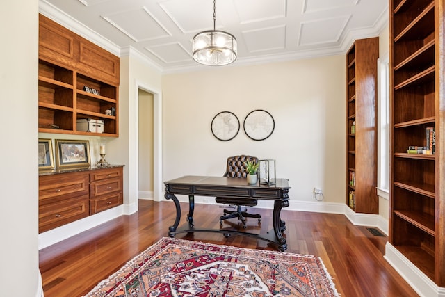 office featuring ornamental molding, dark hardwood / wood-style flooring, a chandelier, and built in features