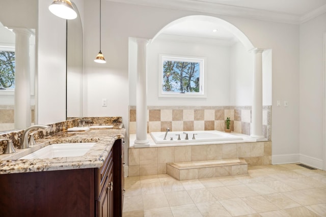 2971 Spanntown Rd, Arrington, TN 37014 - bathroom with decorative columns, healthy amount of natural light, a garden tub, crown molding, and vanity