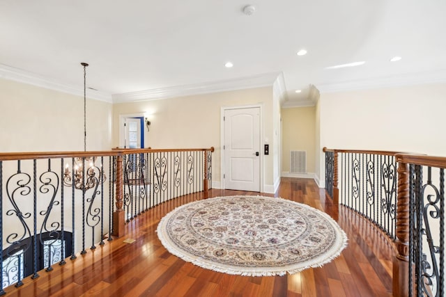 2971 Spanntown Rd, Arrington, TN 37014 - hallway featuring an upstairs landing, a chandelier, wood finished floors, crown molding, and baseboards