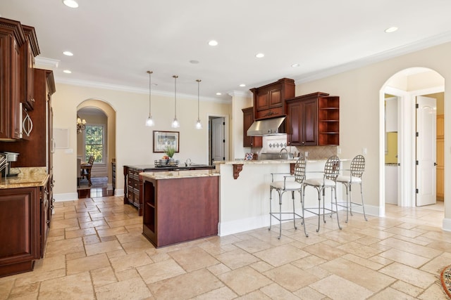2971 Spanntown Rd, Arrington, TN 37014 - kitchen with open shelves, a peninsula, arched walkways, recessed lighting, and stone tile floors