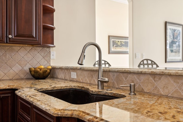 2971 Spanntown Rd, Arrington, TN 37014 - kitchen featuring a sink, open shelves, dark brown cabinetry, and backsplash