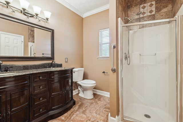 bathroom with vanity, crown molding, toilet, and an enclosed shower