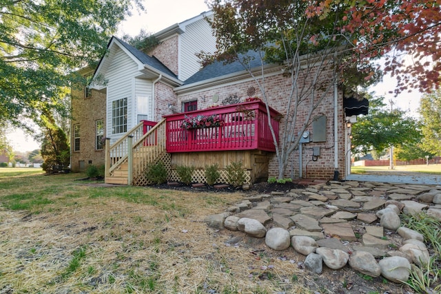 back of property with a deck