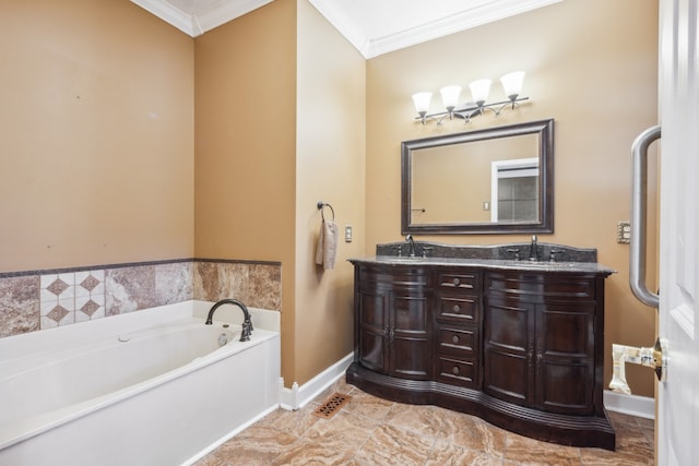 bathroom with vanity, ornamental molding, and a bathtub