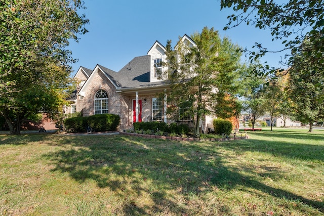 view of front facade with a front yard