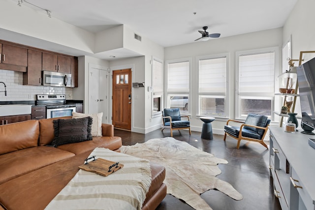 living room featuring ceiling fan