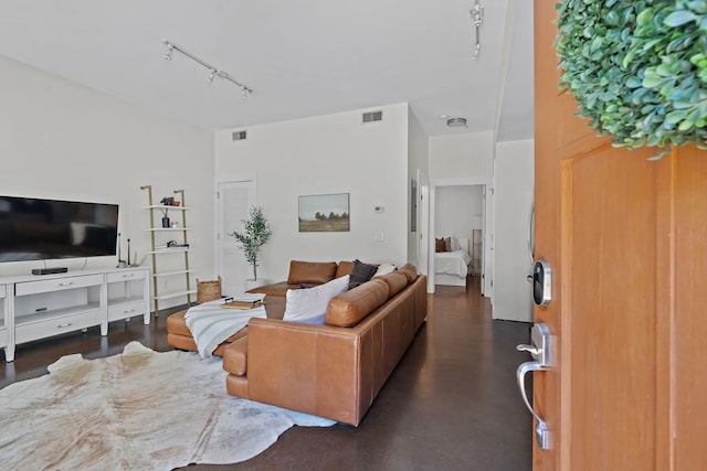 living room featuring track lighting