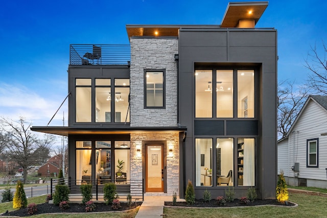 contemporary home featuring a balcony