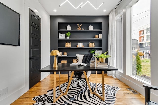 office area with light wood-type flooring