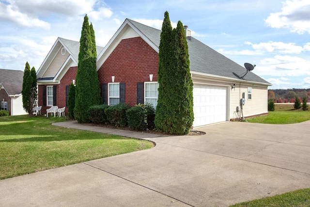 view of property exterior with a yard and a garage