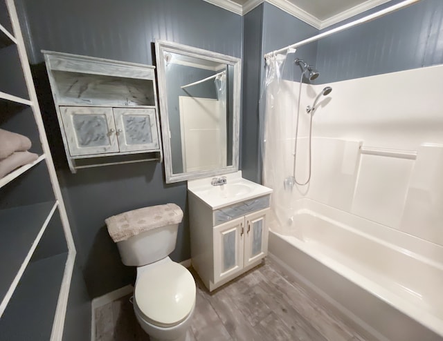 full bathroom featuring hardwood / wood-style flooring, vanity, shower / bath combo, crown molding, and toilet