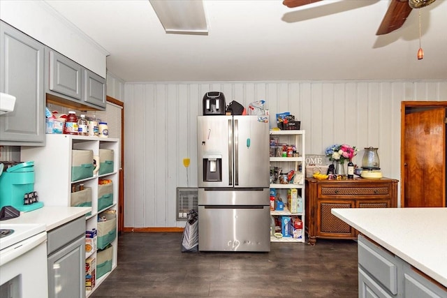 kitchen with stainless steel fridge with ice dispenser, gray cabinets, ceiling fan, and dark wood-type flooring