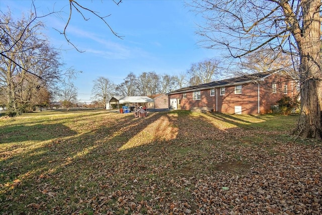 view of yard featuring a carport