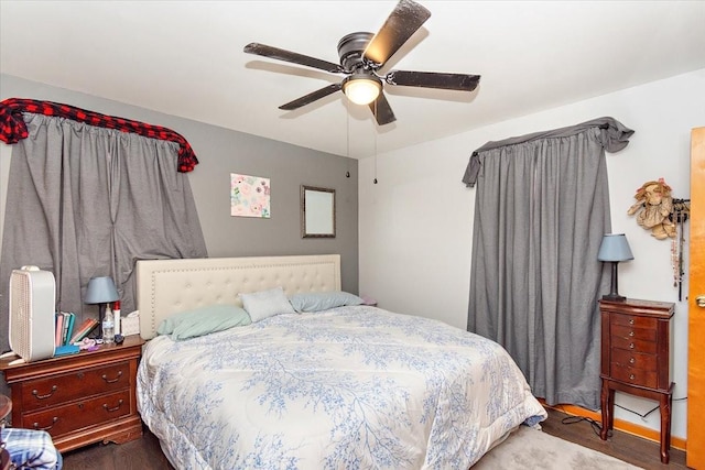 bedroom featuring hardwood / wood-style flooring and ceiling fan