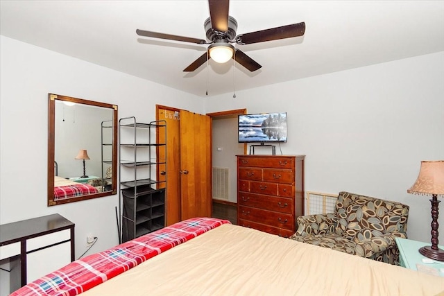 bedroom featuring ceiling fan