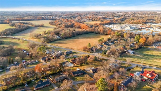 birds eye view of property featuring a rural view