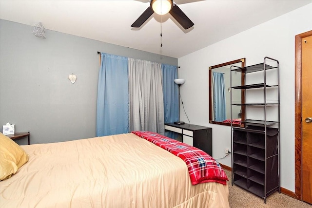 bedroom featuring ceiling fan and carpet floors