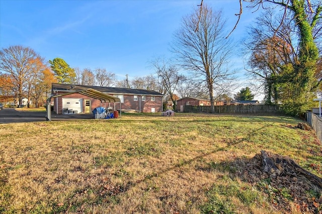 view of yard with a carport