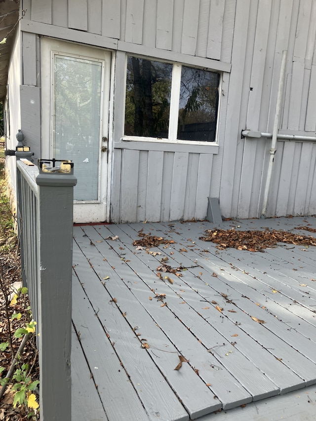 doorway to property with a wooden deck