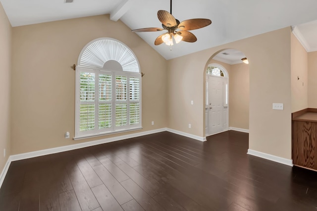 unfurnished room with lofted ceiling with beams, dark hardwood / wood-style floors, and ceiling fan