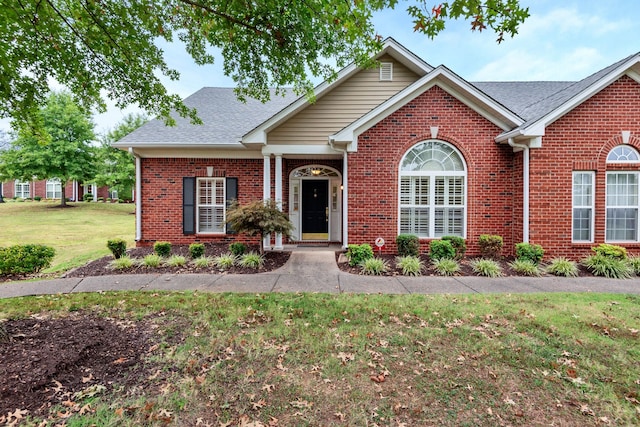 view of front of property with a front yard