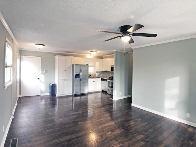 unfurnished living room featuring crown molding, dark hardwood / wood-style floors, a textured ceiling, and ceiling fan