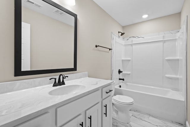 full bathroom featuring vanity, toilet, and washtub / shower combination