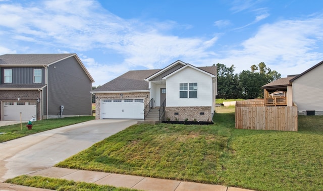 view of front facade with a garage and a front yard