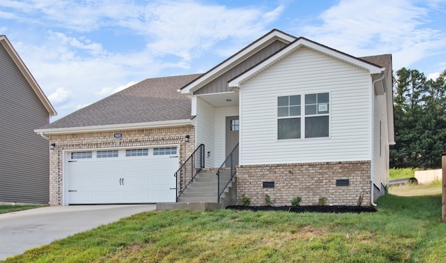 view of front of property featuring a garage and a front yard