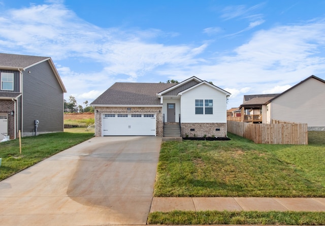 view of front of home featuring a garage and a front yard