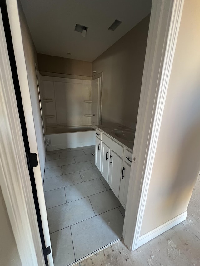 bathroom featuring vanity and bathing tub / shower combination