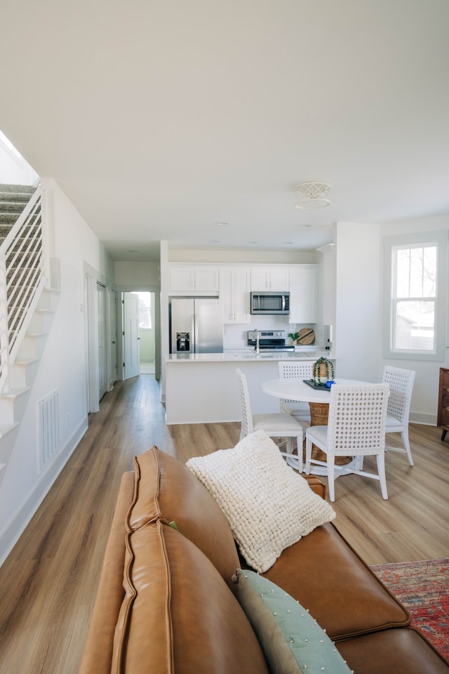 living room featuring light hardwood / wood-style floors