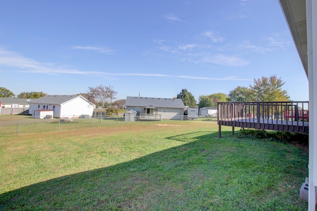 view of yard featuring a wooden deck