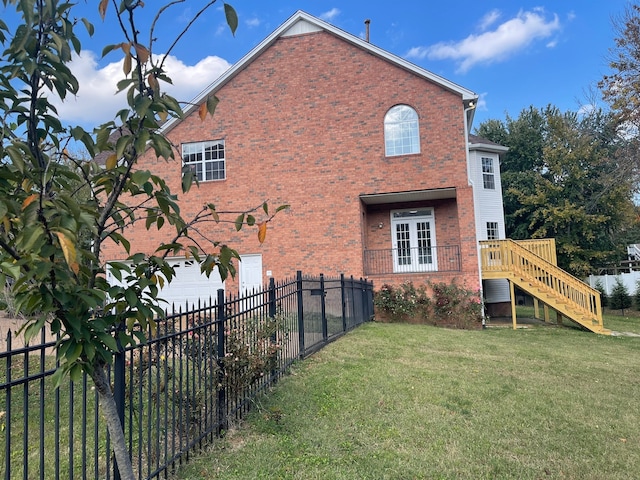 view of property exterior featuring a yard and a garage