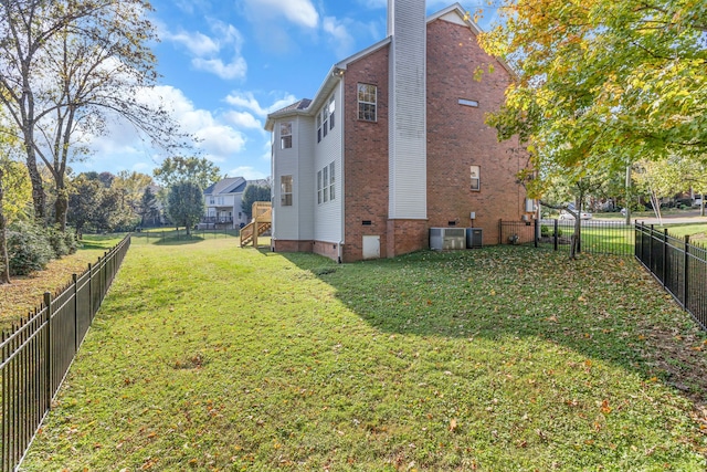 view of home's exterior with a lawn