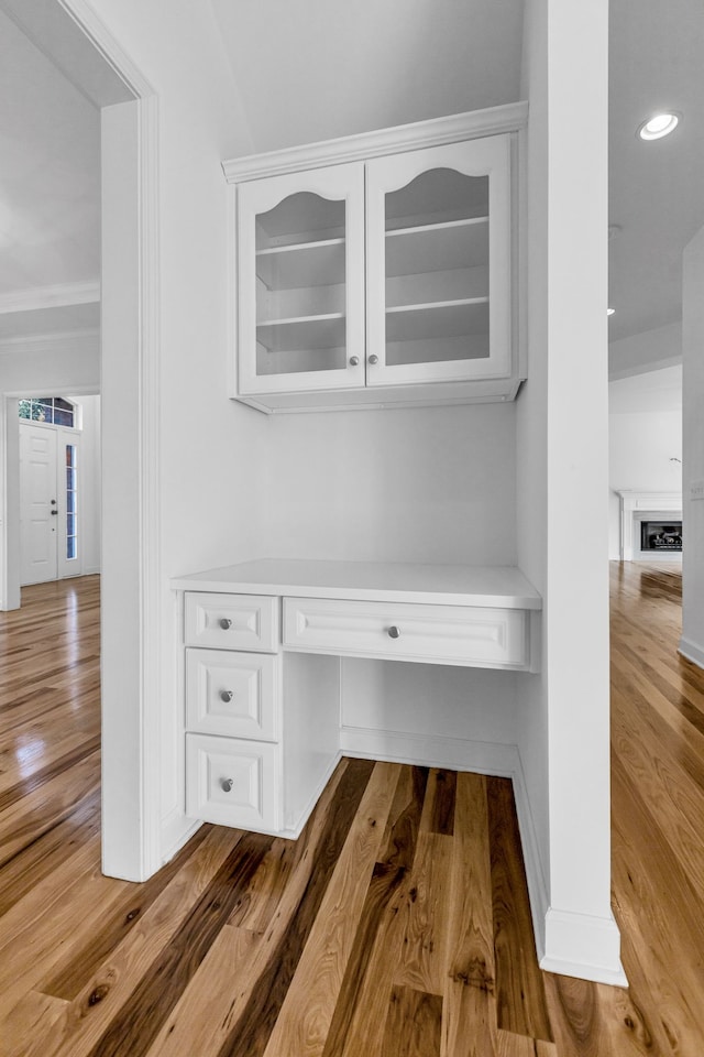 unfurnished office featuring hardwood / wood-style flooring