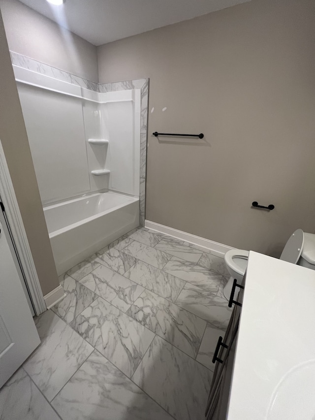 bathroom with shower / bath combination and toilet