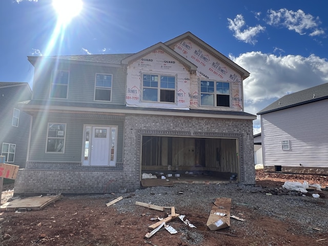 view of front of home featuring a garage