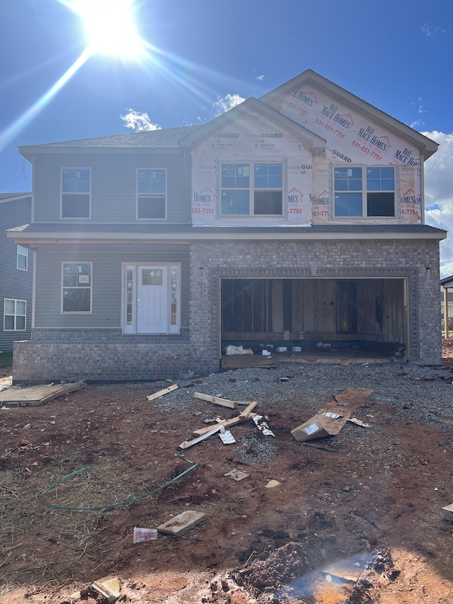 view of front of home with a garage