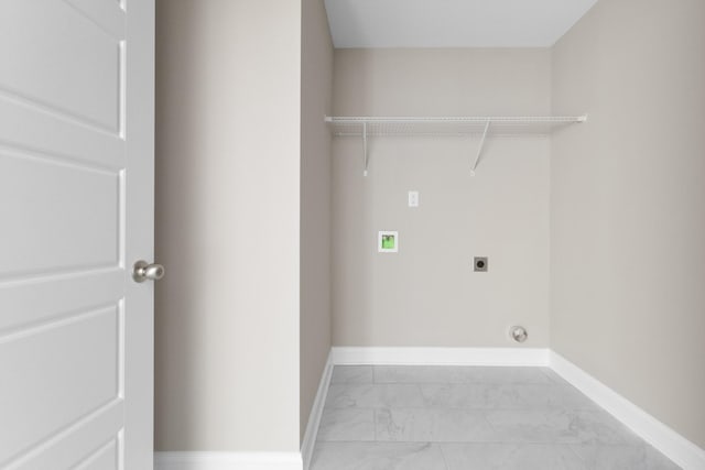 laundry area with washer hookup, marble finish floor, hookup for an electric dryer, laundry area, and baseboards