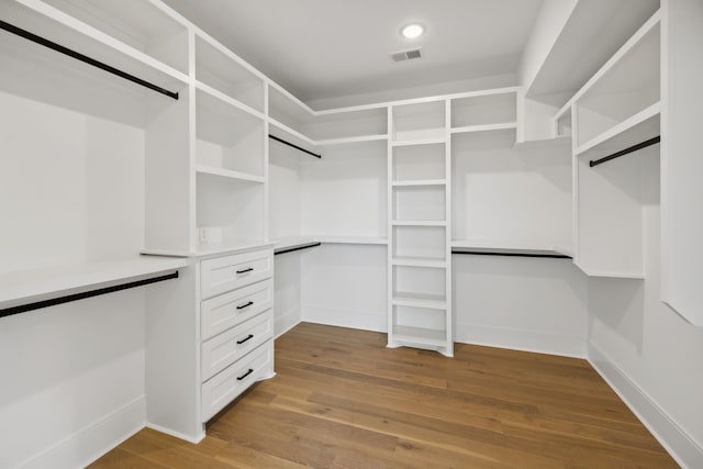 walk in closet featuring light hardwood / wood-style floors