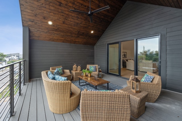 deck featuring ceiling fan and outdoor lounge area