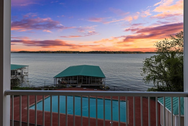 view of dock featuring a water view and boat lift