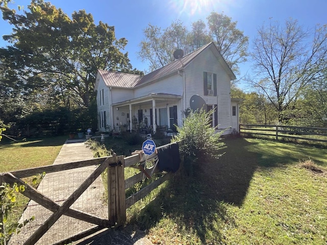 view of front of property with a front lawn