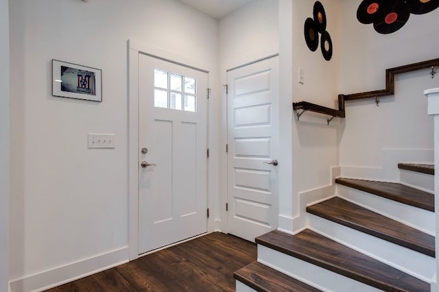 entrance foyer featuring dark hardwood / wood-style floors