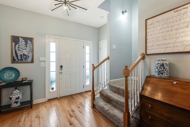 entryway with light hardwood / wood-style flooring